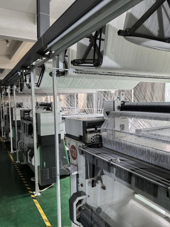 Jacquard weaving looms producing our own curtain fabrics